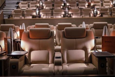 Seats with LED lamps with USB and cupholder in Cinépolis Luxury Cinemas ...