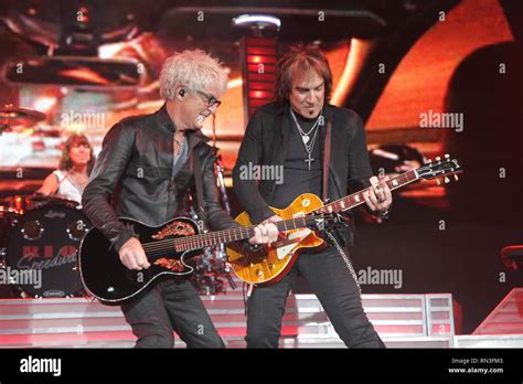 Band members of the rock band REO Speedwagon are shown performing on ...