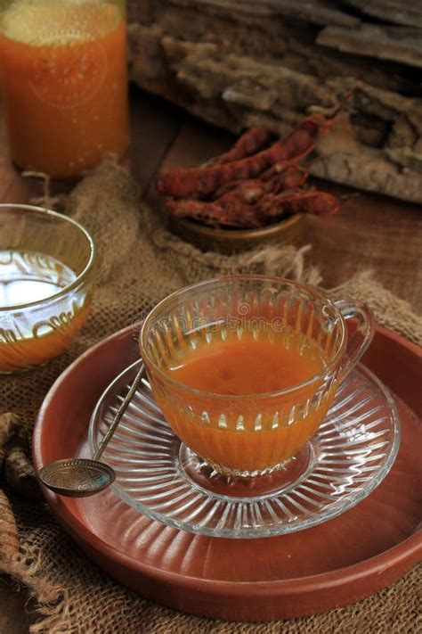 Kunyit Asam is Indonesian Traditional Herbal Drink for Women. Made from Turmeric and Tamarind ...