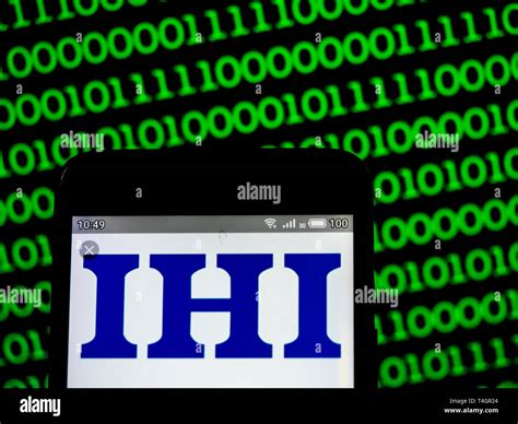 In this photo illustration a IHI Corporation logo seen displayed on a ...