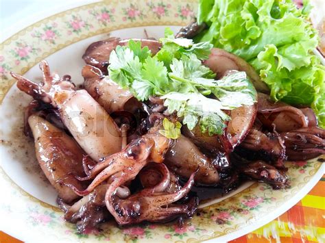 Stir-fried squid asia food | Stock image | Colourbox