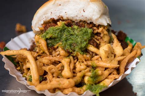 Famous Vada Pav Near Me / Vada pau bread and green sauce on a plate in ...