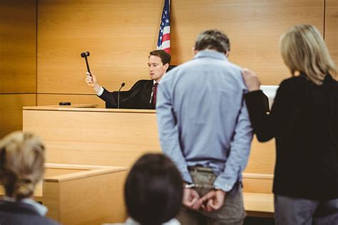 Man In Handcuffs In Court Stock Photos, Pictures & Royalty-Free Images - iStock