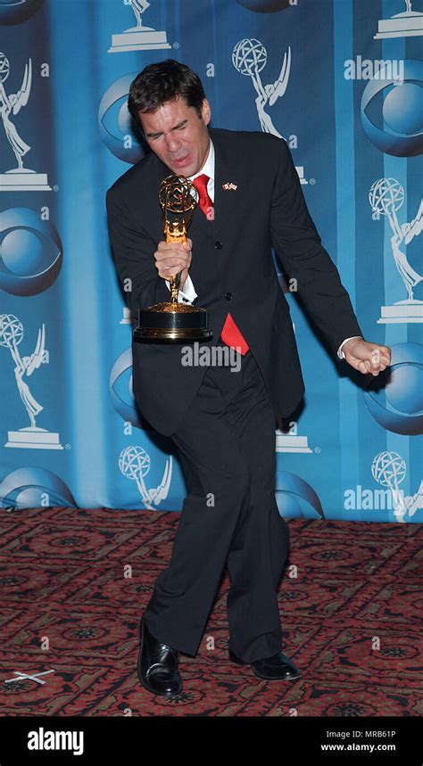 Eric McCormack jokes with Emmy at the 53rd Primetime Emmy Awards at the ...