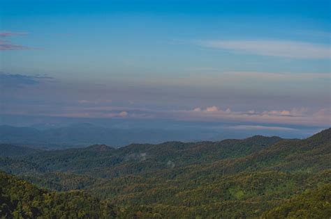 Premium Photo | Sunrise view and layers mountain with sea of mist at rural area chiangmaichiang ...