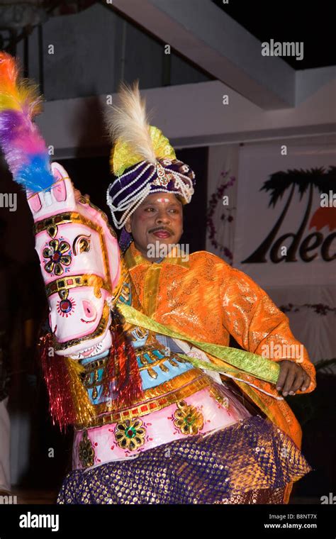 India Tamil Nadu Mamallapuram traditional male folk dancer in horse ...