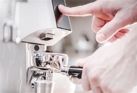 Premium Photo | Fresh arabica coffee grinding