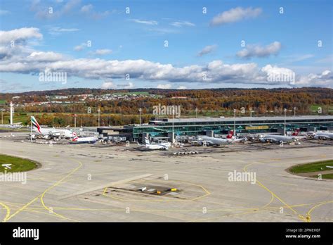 Zurich, Switzerland – November 16, 2022: Aerial view of Zurich Airport Terminal Gates E in ...