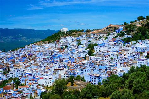 Beautiful city of Chefchaouen, Morocco, built on a hill slope. Houses ...