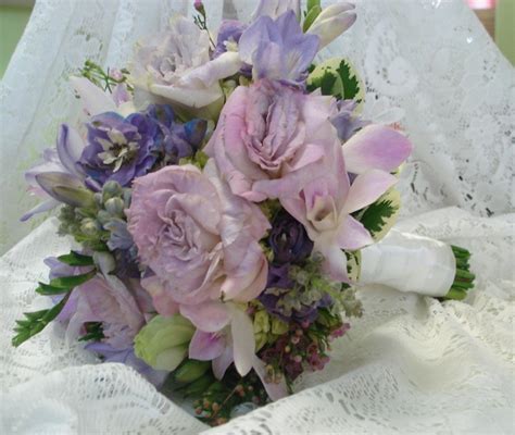 Hand tied bridal bouquet with orchids, lisanthus, hydrangea. Hand Tied Bridal Bouquet, Flower ...