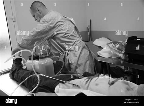 Dead bodies preparation Black and White Stock Photos & Images - Alamy