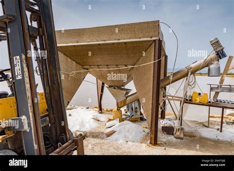 Salt processing, Italy Stock Photo - Alamy