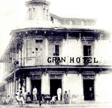 an old black and white photo of people standing in front of a building with the name gran hotel ...