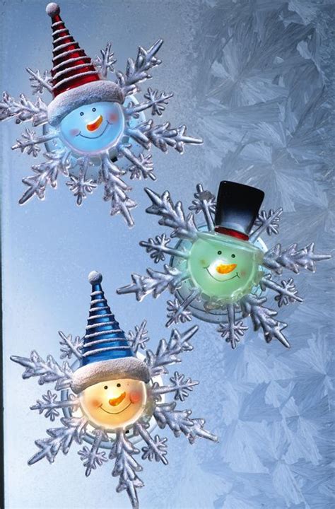 Changing Suction Cup Holiday Window Snowflakes | Christmas