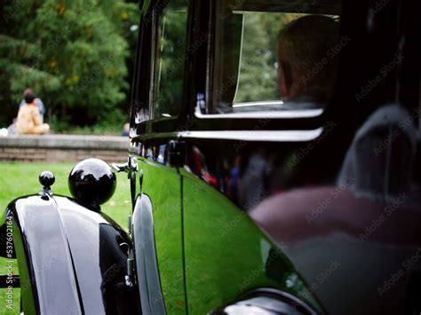 Vintage classic car side view in car park side view Stock Photo | Adobe Stock