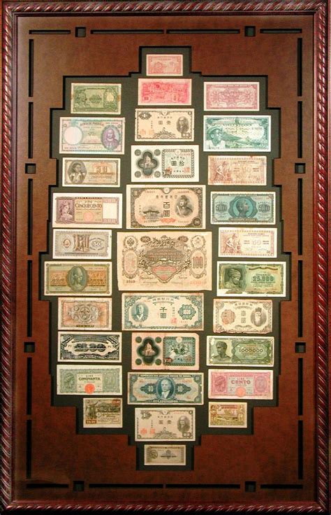 Collection of international currency in a Bradley's custom frame. Perfect to showcase a world ...