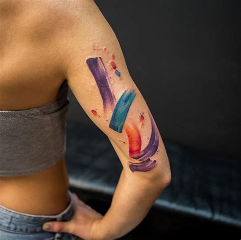 Watercolor Brush Strokes On Womans Arm | Best tattoo design ideas