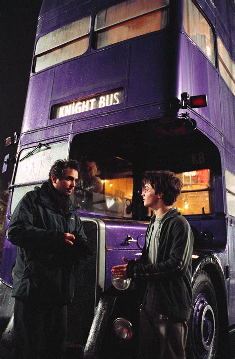 Alfonso Cuarón and Dan Radcliffe in front of the Knight Bus — Harry ...