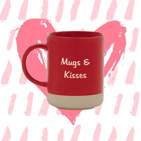a red mug with the words hugs and kisses on it in front of a pink heart