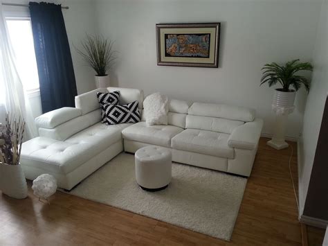 Modern living room with white leather sectionals | White leather sofas, Leather sofa living room ...