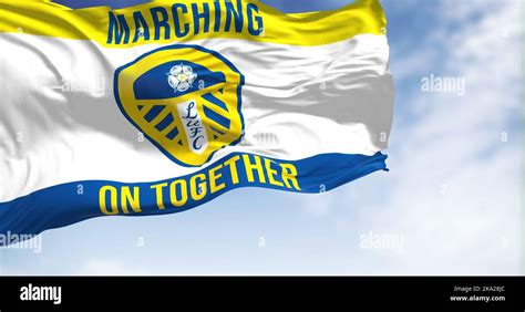 Leeds, UK, Oct. 2022: The Leeds United flag waving in the wind. Leeds United Football Club is an ...