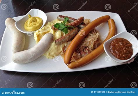 Assorted Sausage Platter at a German Restaurant Served with Mashed ...