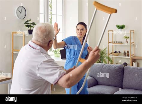 Nurse and angry patient at home hi-res stock photography and images - Alamy
