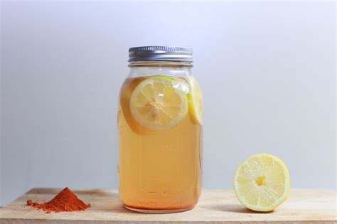 Lemonade Juice in Mason Jar and Cut Lemon Slice