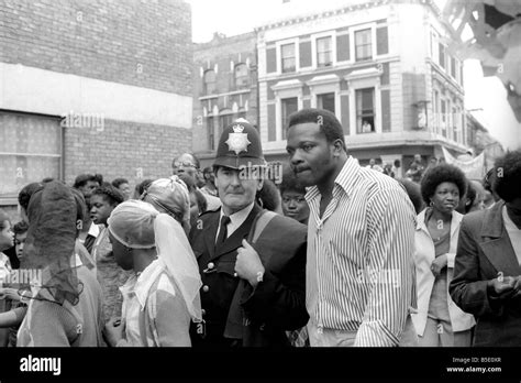 Notting Hill Carnival : Police and carnival goers seen here enjoying the music and the ...