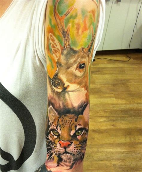 Awesome watercolor animal tattoo on full sleeve - Tattooimages.biz