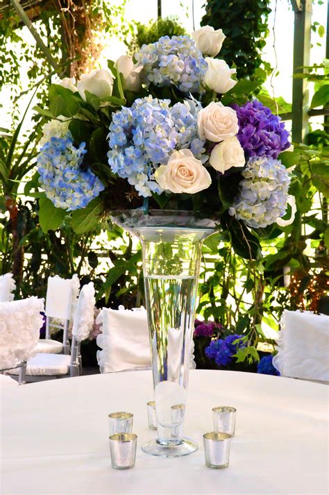 Tall centerpiece with blue hydrangea and vendella roses White Hydrangea Centerpieces, Large ...