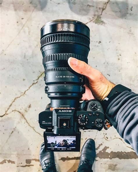 Do you own any cinema lenses? Sony A7Sii with a Sony FE PZ 28-135mm f/4 lens. Photo by ...