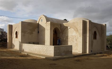 The New Humanitarian | Mud brick houses in Gaza