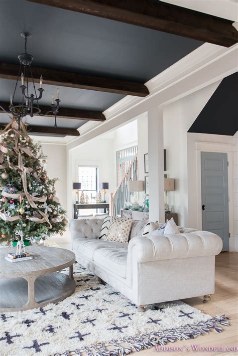 vintage-living-room-black-ceiling-brick-fireplace-dark-wood-beams ...