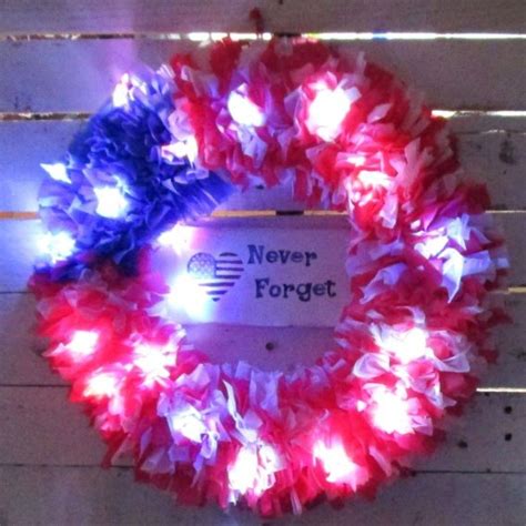 A beautiful Patriotic Outdoor Rag Wreath/lit with red,white and blue star lights #red #blue # ...