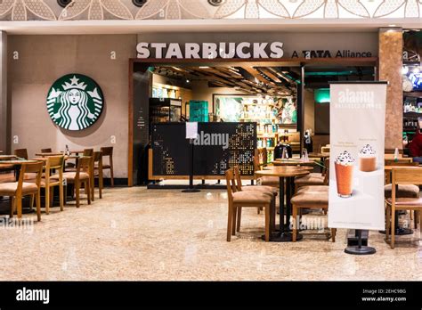 Starbucks India a Tata Alliance in Mumbai airport terminal Stock Photo ...