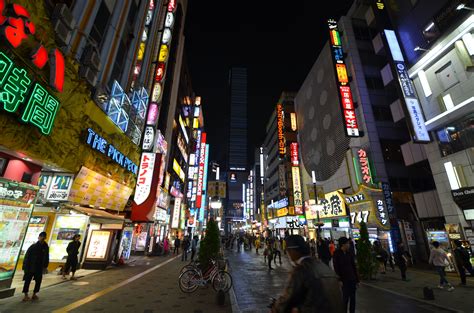 Shinjuku at night in Tokyo, Japan Finned, Tokyo Japan, Times Square, Traveling, Night, Landmarks ...