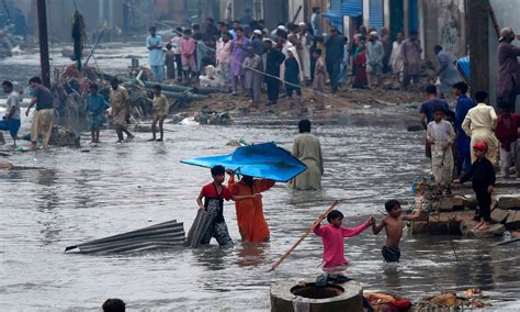 In pictures: Torrential rain floods Karachi, shatters records ...