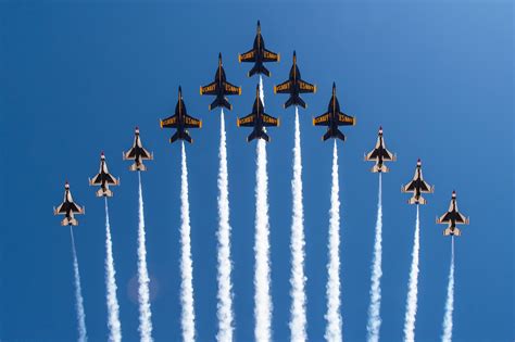 For the first time ever, the Thunderbirds and U.S. Navy Blue Angels debut a flight formation ...