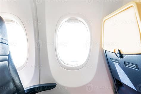 Simple interior of a low cost airplane 14396857 Stock Photo at Vecteezy