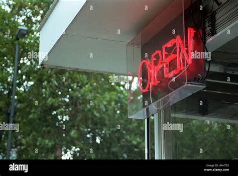 neon shop open sign Stock Photo - Alamy