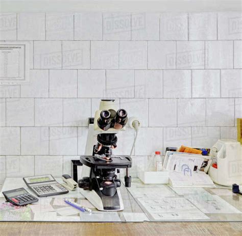 Microscope and scientific equipment in a laboratory - Stock Photo - Dissolve