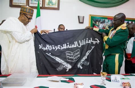 Army Presents Captured Boko Haram Flag To Buhari