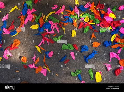 Burst balloons on the ground Stock Photo - Alamy