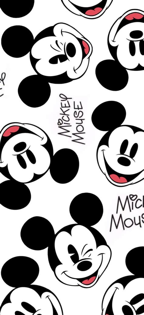 an image of mickey mouse faces on white paper with black and red ...