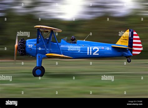 Boeing Stearman biplane taking off Stock Photo - Alamy