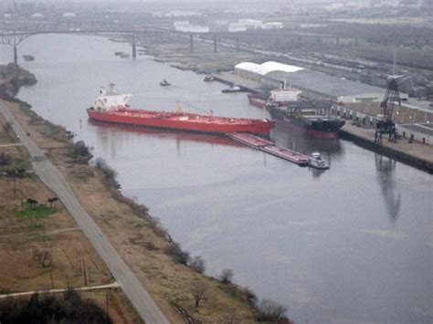 Tanker, Barge collision closes waterway, spills oil