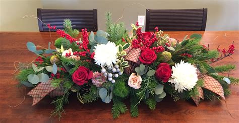 How to Make a Christmas Centerpiece with Fresh Greens | Holiday flower arrangements, Holiday ...