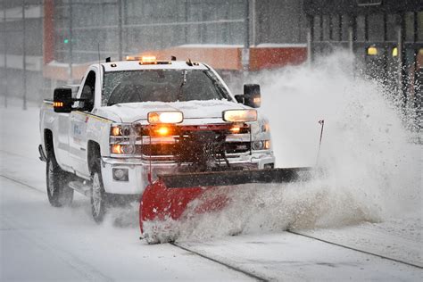 Photos: Kansas City draped in snow after winter storm, closing schools and businesses | KCUR ...