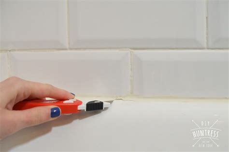 How To Re-Caulk Your Bathtub (The Right Way) - DIY Huntress